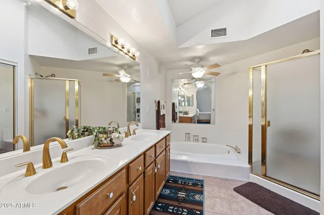 a view of a room with windows and lounge chair