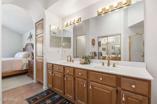 a view of a house with a backyard and a garden