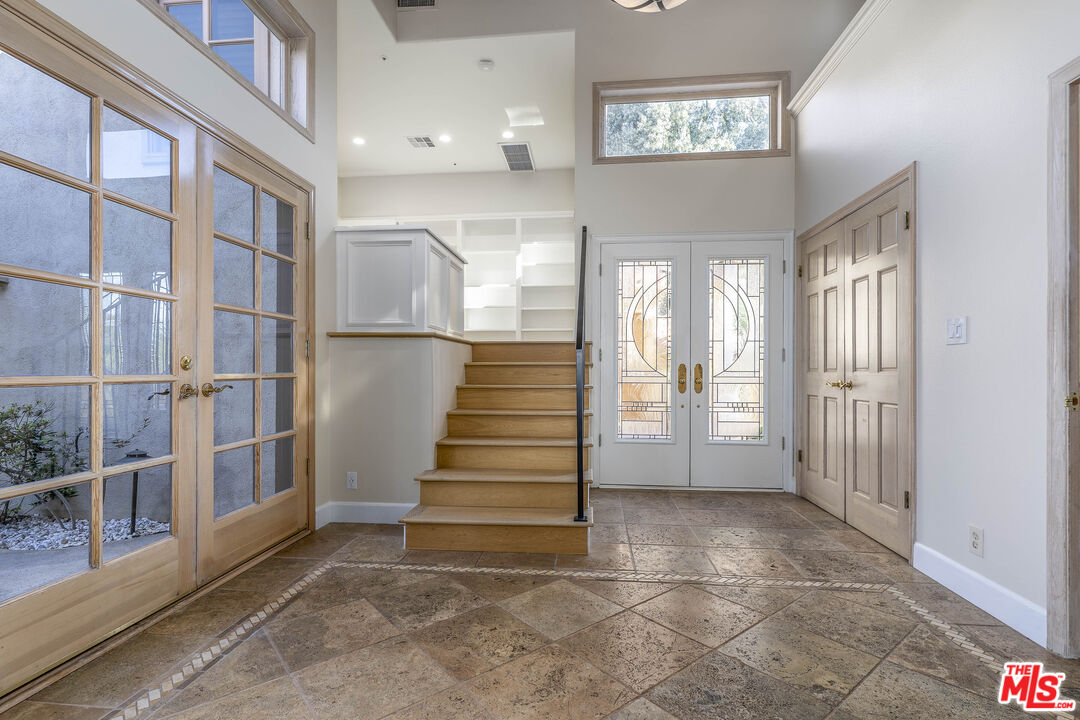 19 Ranchero Road Bell Canyon, CA 91307 - Photo 17 of 46 a view of entryway and hall with wooden floor