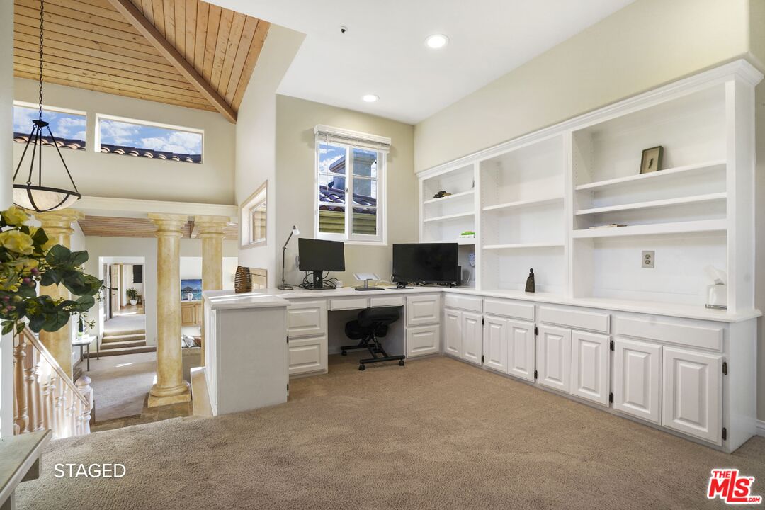 19 Ranchero Road Bell Canyon, CA 91307 - Photo 18 of 46 a kitchen that has a lot of cabinets in it and wooden floor