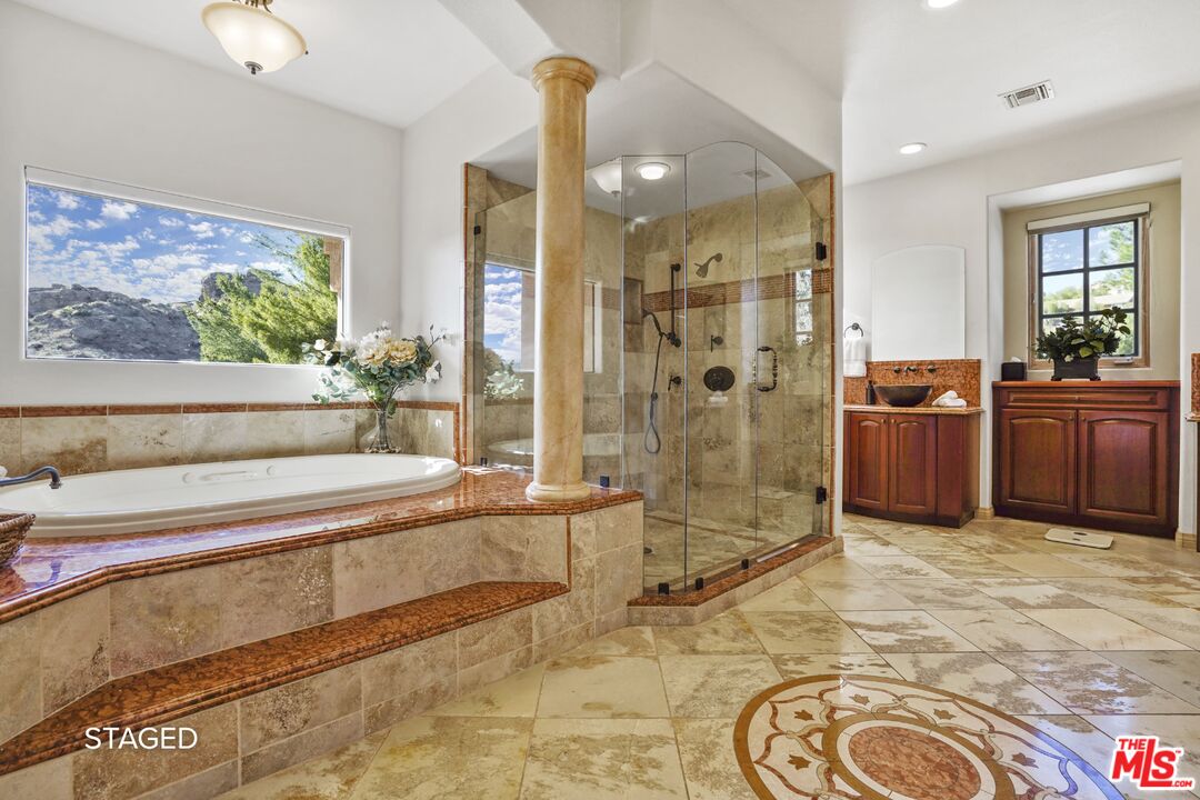 19 Ranchero Road Bell Canyon, CA 91307 - Photo 23 of 46 a spacious bathroom with a tub and shower