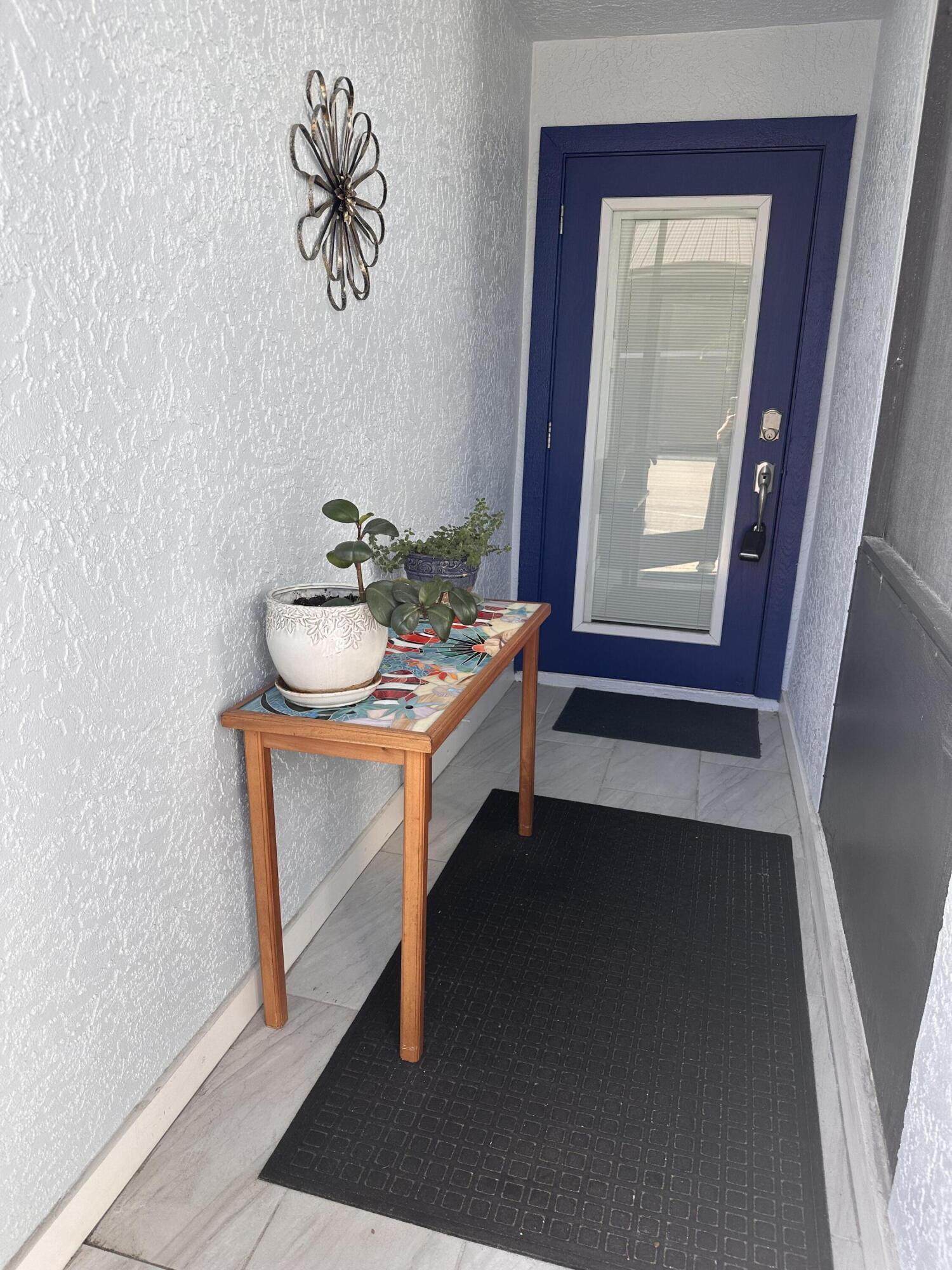 1831 Southwest Palm City Road, Unit C601 Stuart, FL 34994 - Photo 2 of 35 Front door