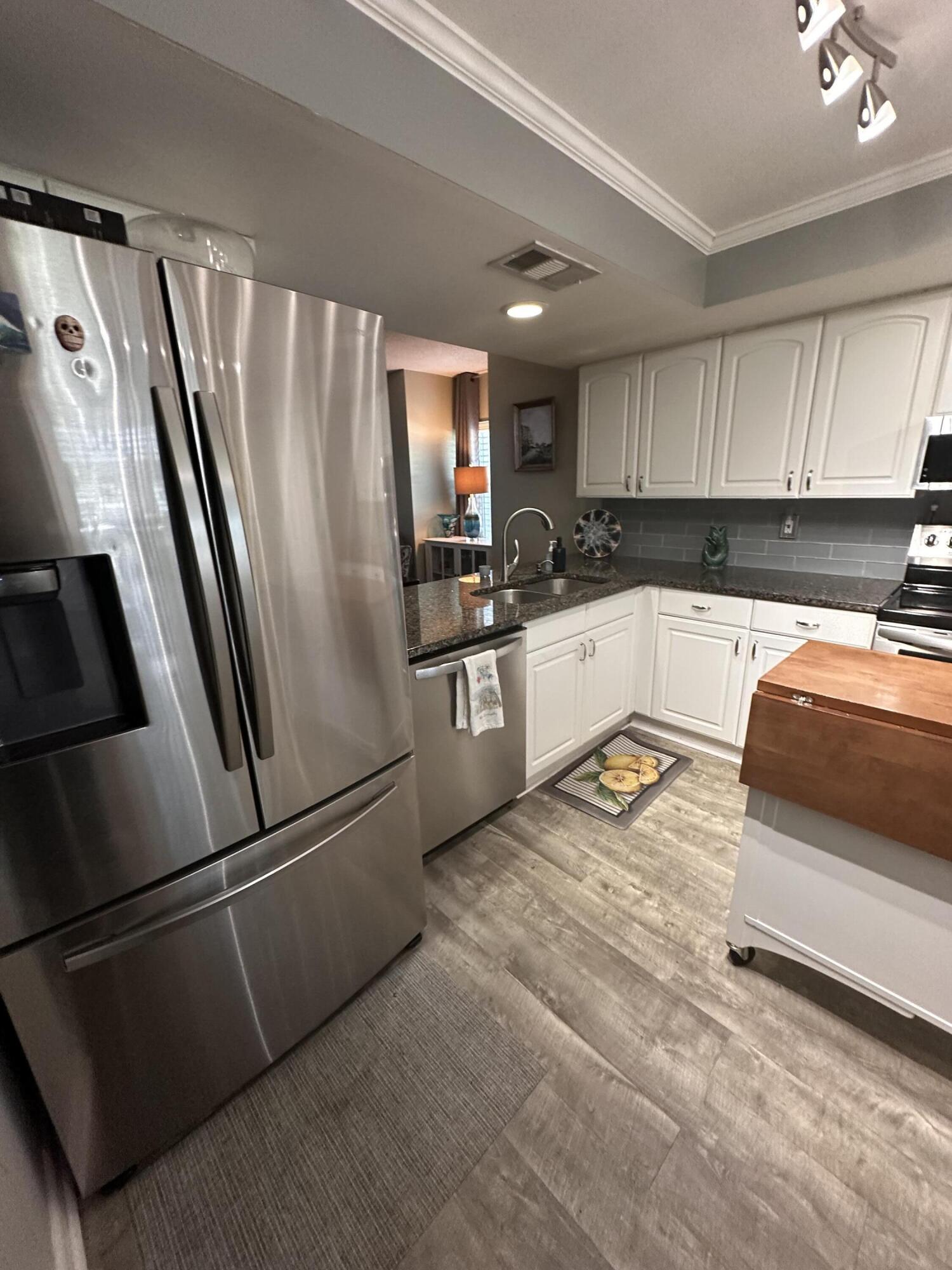 1831 Southwest Palm City Road, Unit C601 Stuart, FL 34994 - Photo 7 of 35 new fridge