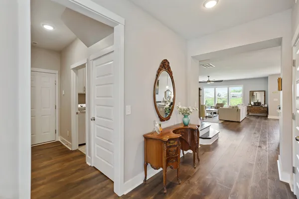 a kitchen with stainless steel appliances granite countertop refrigerator a stove and a sink