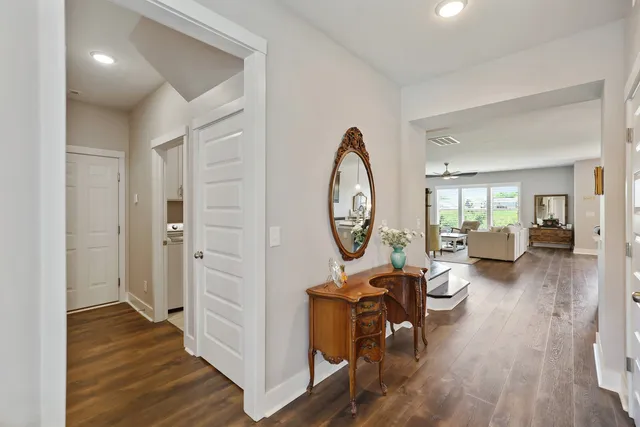 a kitchen with stainless steel appliances granite countertop refrigerator a stove and a sink