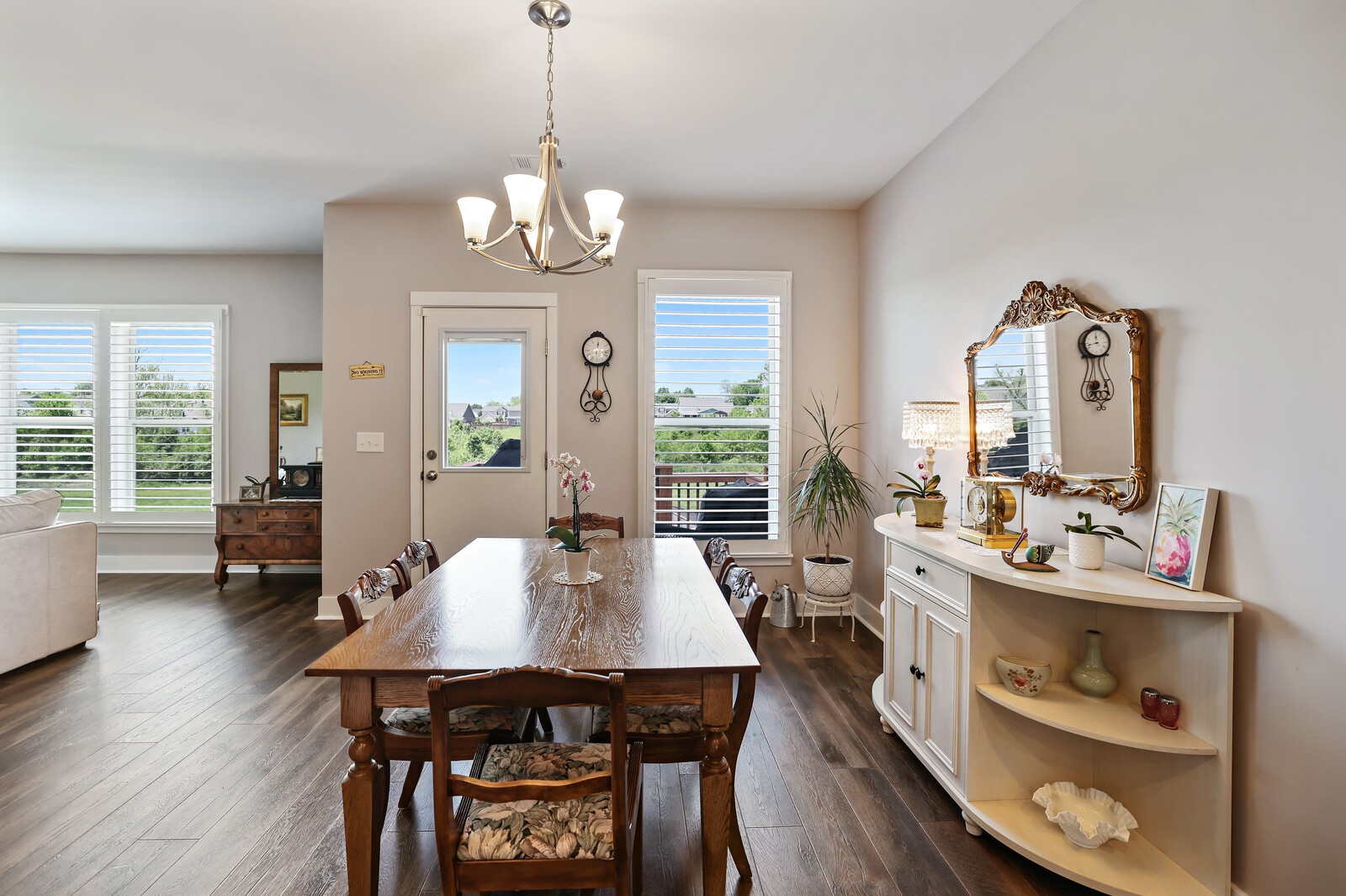 1108 Brixworth Drive Spring Hill, TN 37174 - Photo 24 of 100 a view of a dining room with furniture window and wooden floor