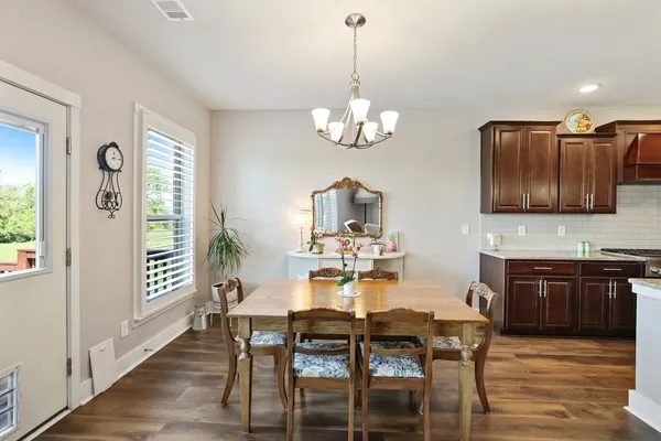 a bathroom with a shower and a sink