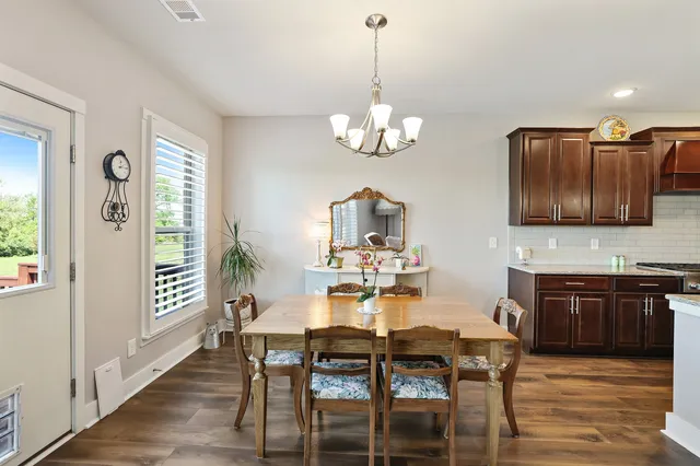 a bathroom with a shower and a sink