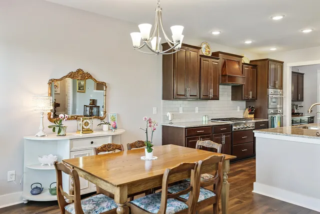 a bathroom with a shower and a sink