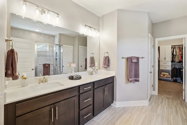 an empty room with furniture and a window