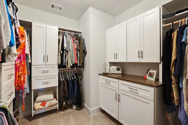 a bathroom with a double vanity sink and mirror