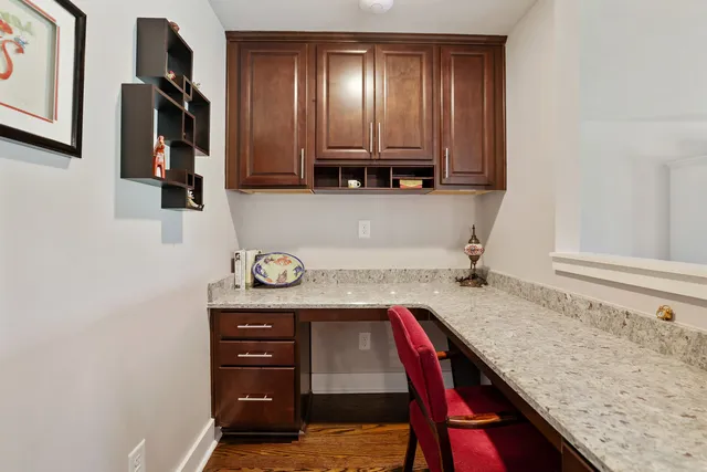 a view of a patio with couple of chairs and a couch