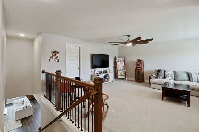 a view of a house with a yard porch and sitting area