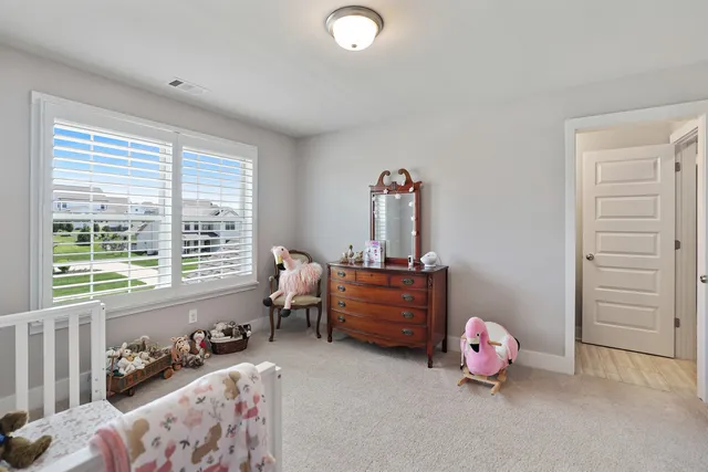 an aerial view of a house with outdoor space sitting space