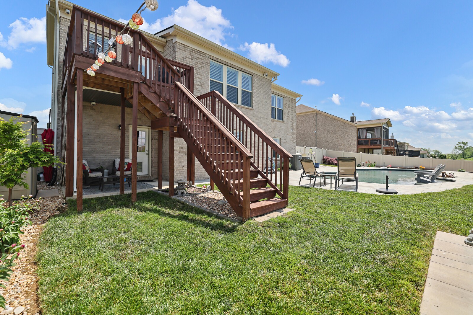1108 Brixworth Drive Spring Hill, TN 37174 - Photo 72 of 100 a view of a house with a yard porch and sitting area