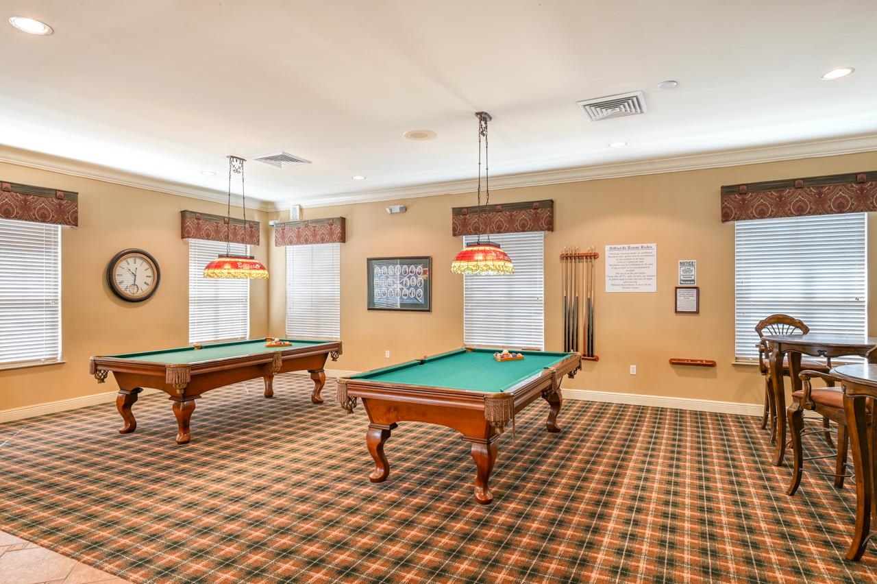 510 Florida Club Boulevard, Unit 303 St. Augustine, FL 32084 - Photo 15 of 24 a living room with furniture and a table
