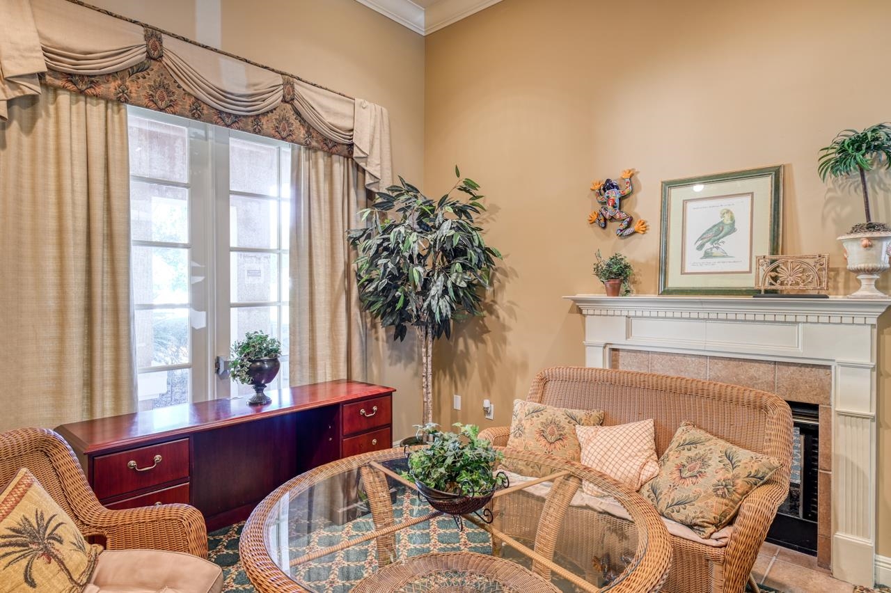 510 Florida Club Boulevard, Unit 303 St. Augustine, FL 32084 - Photo 18 of 24 a living room with furniture and a large window