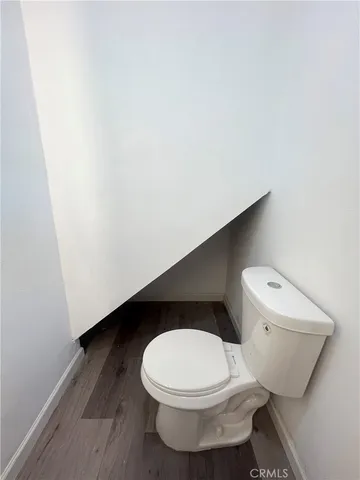 a bathroom with a toilet and a sink