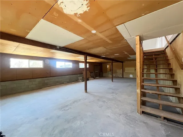 a view of a yard covered with snow