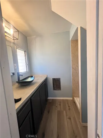a view of a kitchen from the hallway