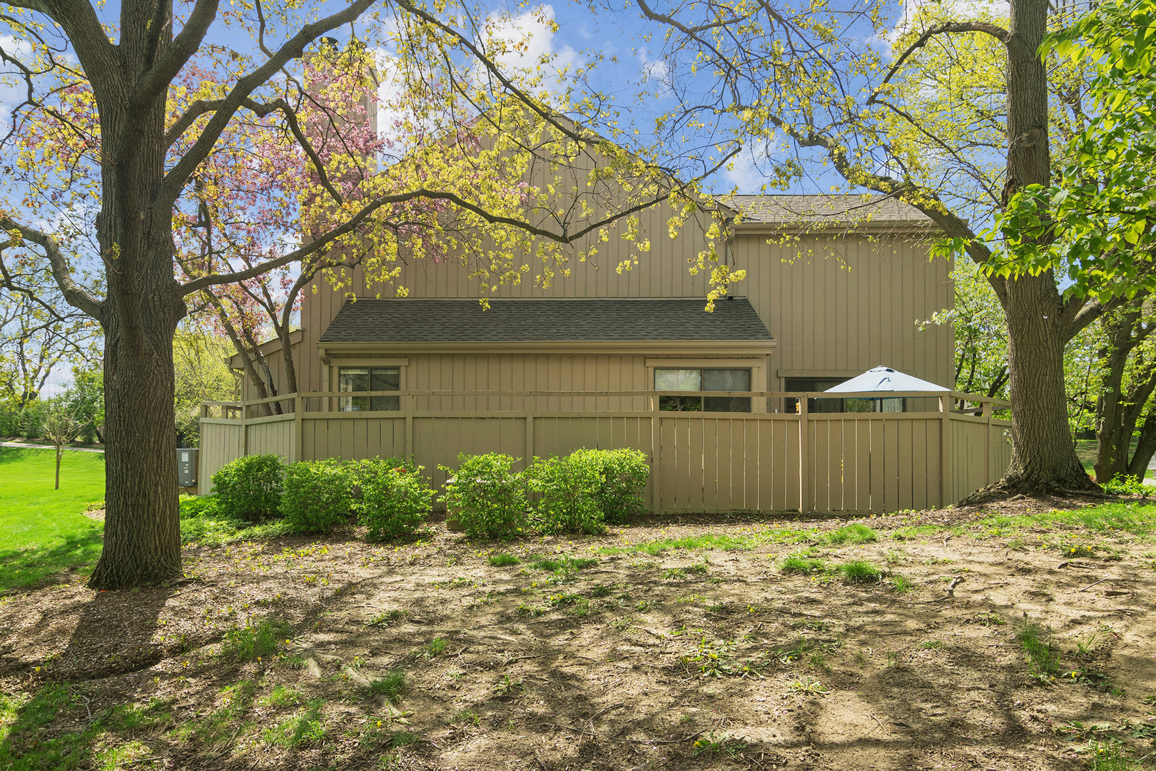471 Old Barn Road Lake Barrington, IL 60010 - Photo 2 of 44 a front view of a house with a yard and garage