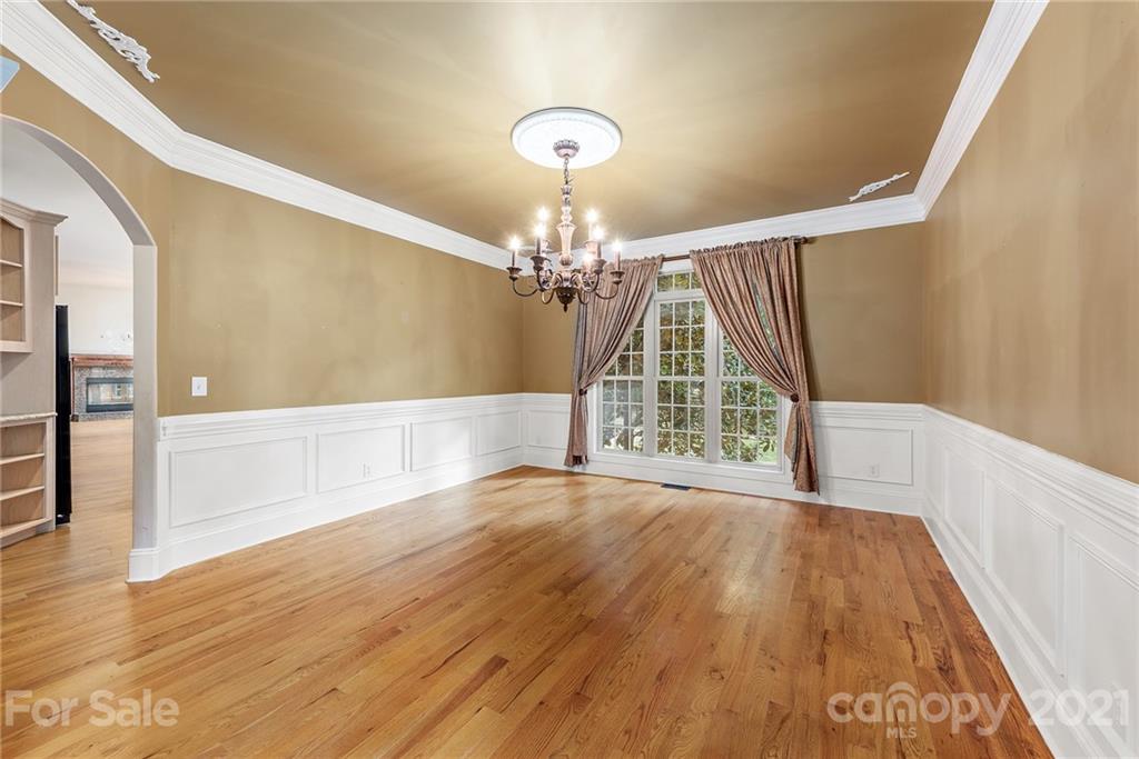 3268 Millstone Creek Road Lancaster, SC 29720 - Photo 11 of 35 a view of a room with wooden floor fan and windows