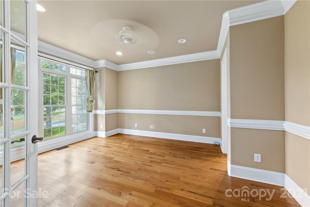 3268 Millstone Creek Road Lancaster, SC 29720 - Photo 13 of 35 a view of an empty room with wooden floor and a window