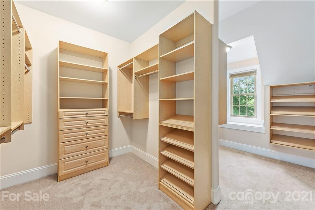 3268 Millstone Creek Road Lancaster, SC 29720 - Photo 19 of 35 a view of walk in closet with clothes and shoes