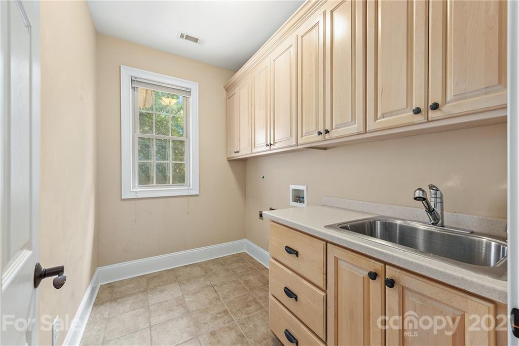 3268 Millstone Creek Road Lancaster, SC 29720 - Photo 25 of 35 a kitchen with stainless steel appliances granite countertop a sink and dishwasher