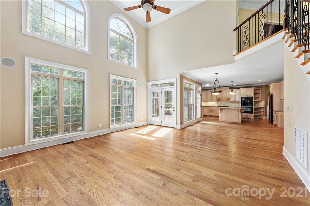 3268 Millstone Creek Road Lancaster, SC 29720 - Photo 7 of 35 a view of an empty room with a window and wooden floor