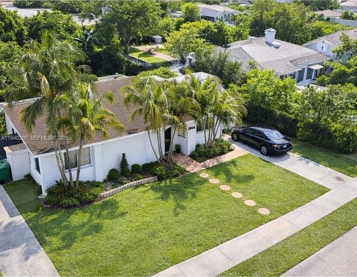20125 Southwest 124th Avenue Miami, FL 33177 - Photo 1 of 21 a backyard of a house with lots of green space