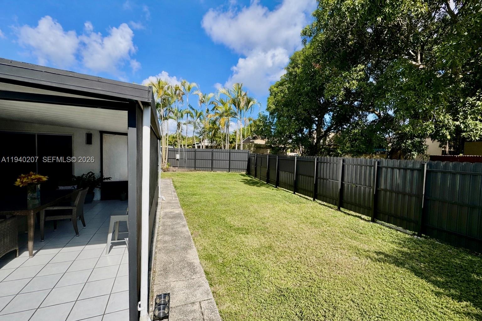 20125 Southwest 124th Avenue Miami, FL 33177 - Photo 17 of 21 a view of a backyard