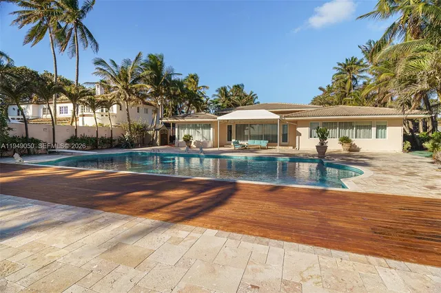 a view of a house with swimming pool