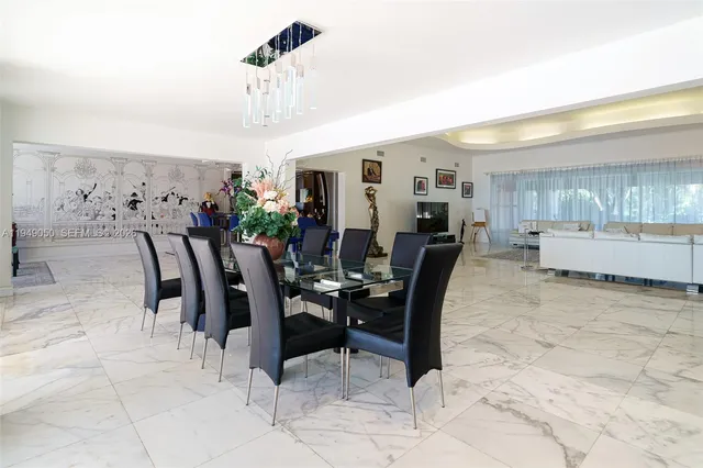 a view of a livingroom with furniture and a fireplace