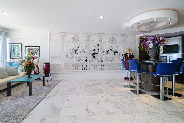a living room with furniture potted plant and a window