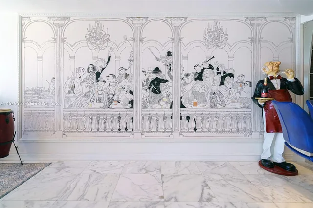 a view of a dining room with furniture and a chandelier