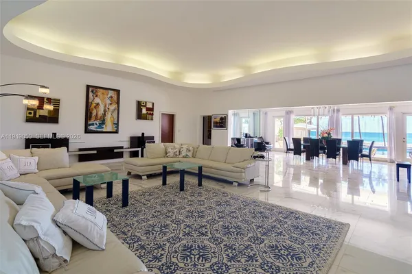 a large kitchen with stainless steel appliances lots of counter top space