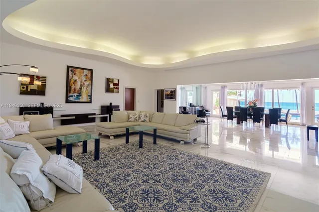 a large kitchen with stainless steel appliances lots of counter top space