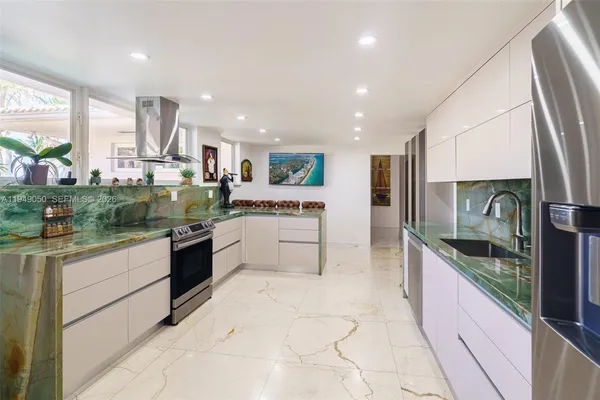 a spacious bedroom with a bed and a couch