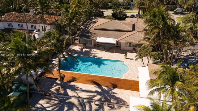 a view of the house with potted plants