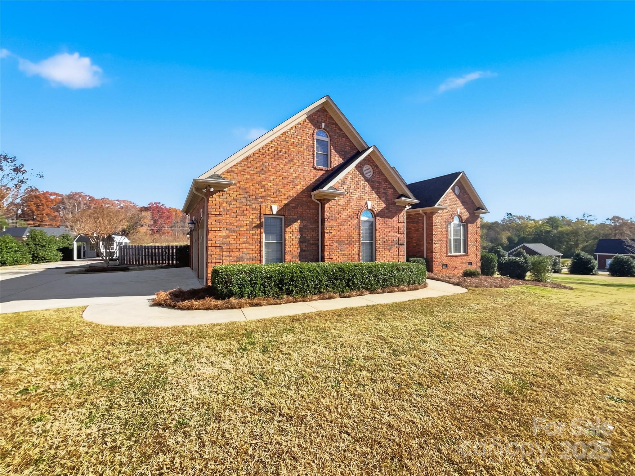 924 Ferguson Ridge Road Gastonia, NC 28052 - Photo 7 of 23 a front view of a house with a yard