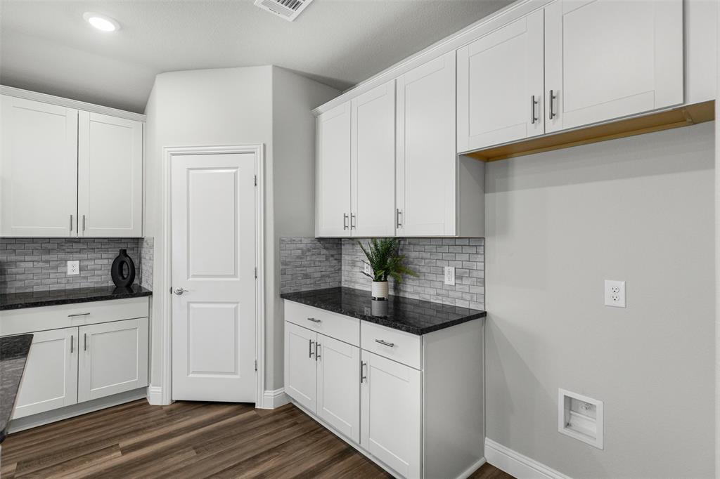 10508 Brookshire Road Fort Worth, TX 76126 - Photo 12 of 31 Kitchen with tasteful backsplash, dark stone counters, white cabinetry, dark wood-style floors, and recessed lighting