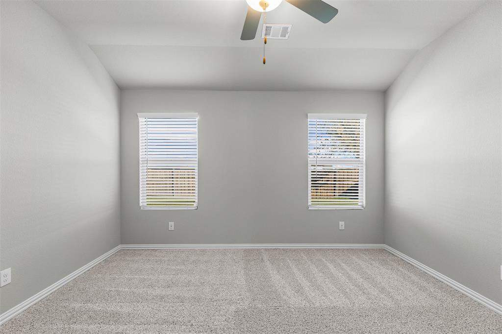 10508 Brookshire Road Fort Worth, TX 76126 - Photo 14 of 31 Large Primary Bedroom with tons of natural light and ensuite bath with a large walk-in closet!