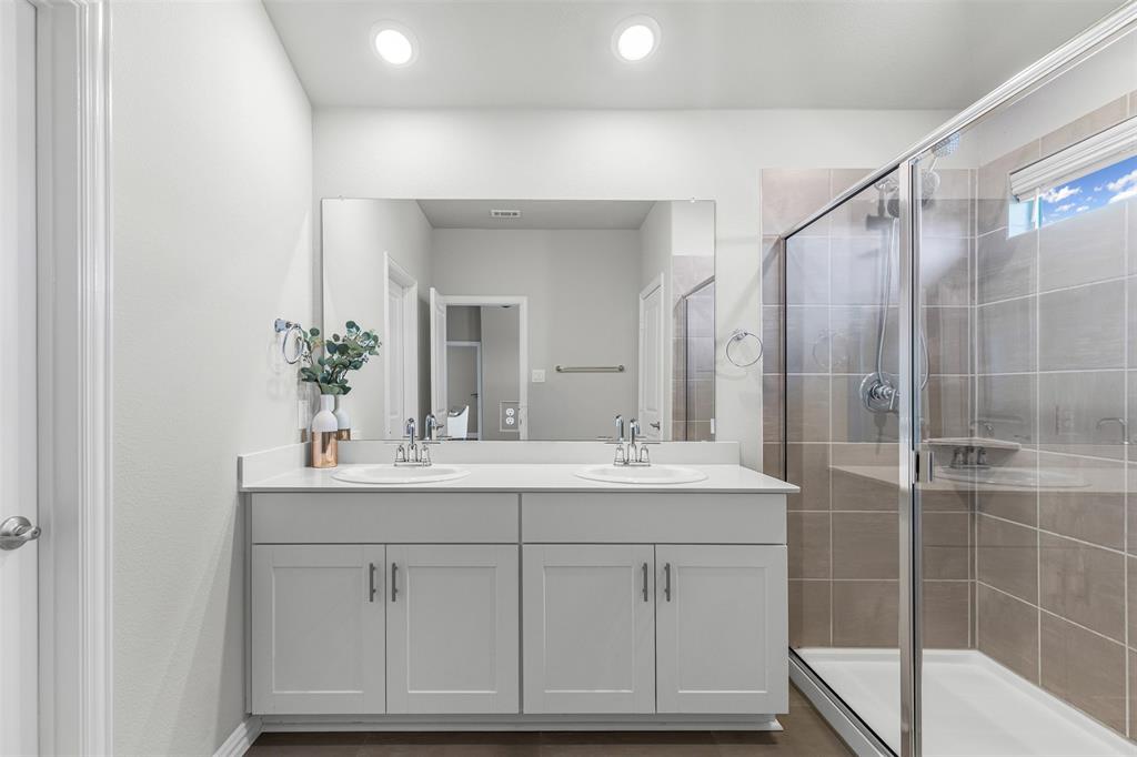 10508 Brookshire Road Fort Worth, TX 76126 - Photo 15 of 31 Beautiful ensuite Primary bathroom with amazing finishes and a linen closet!