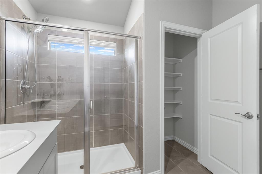 10508 Brookshire Road Fort Worth, TX 76126 - Photo 16 of 31 Beautiful ensuite Primary bathroom with amazing finishes and a linen closet!