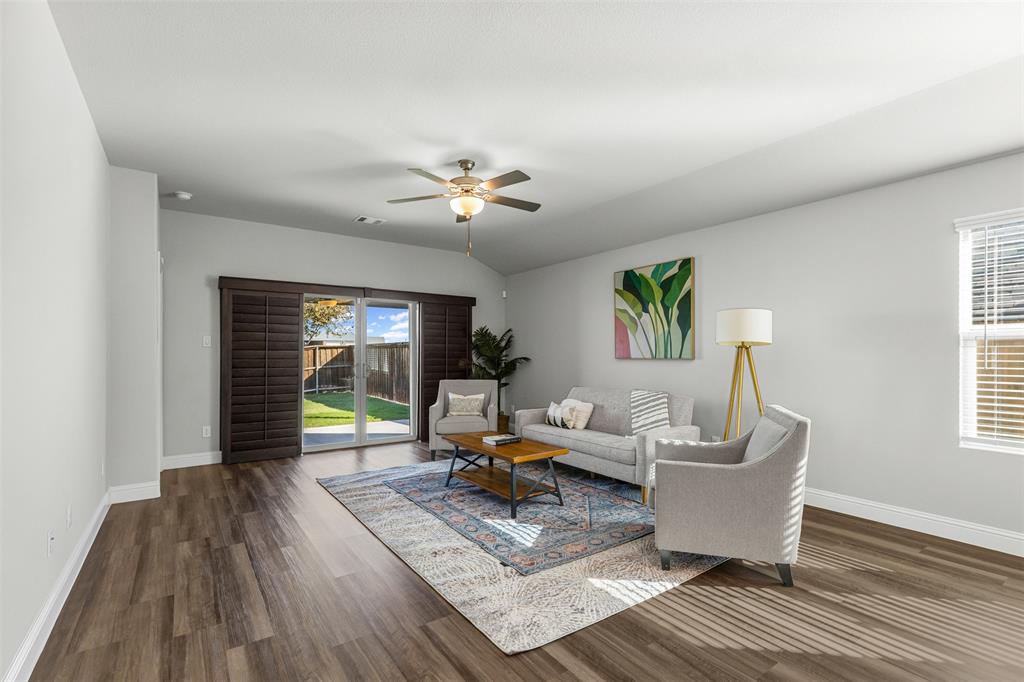 10508 Brookshire Road Fort Worth, TX 76126 - Photo 6 of 31 Living area with dark wood-type flooring, a ceiling fan, and lofted ceiling