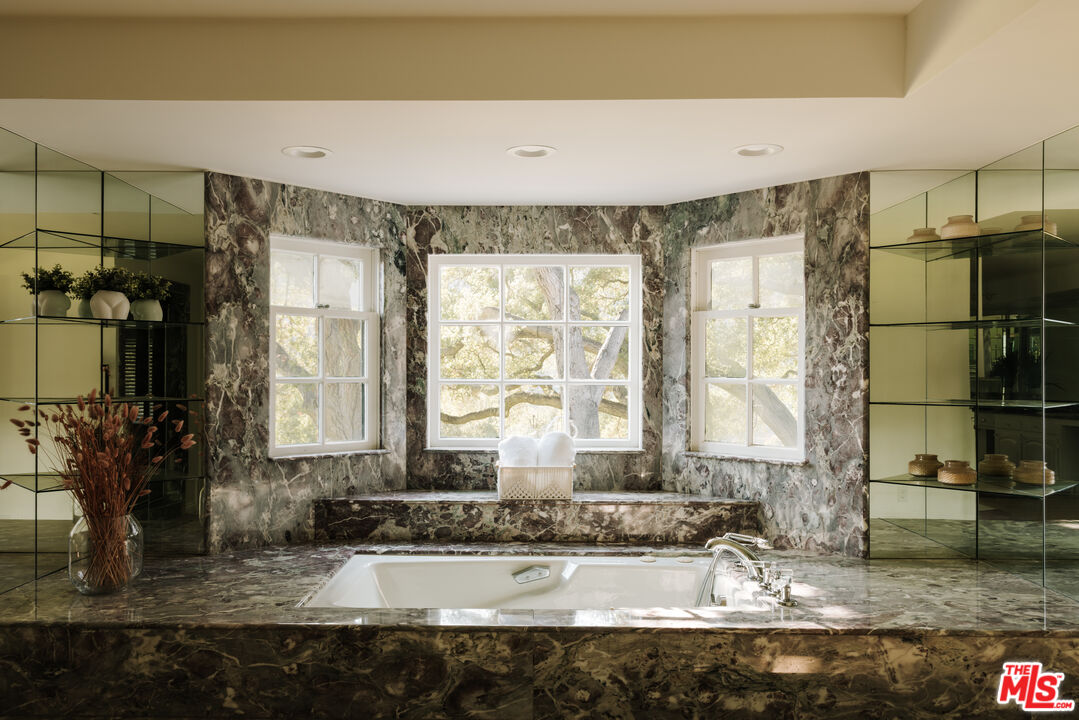 3100 Mandeville Canyon Road Los Angeles, CA 90049 - Photo 13 of 23 a view of a living room