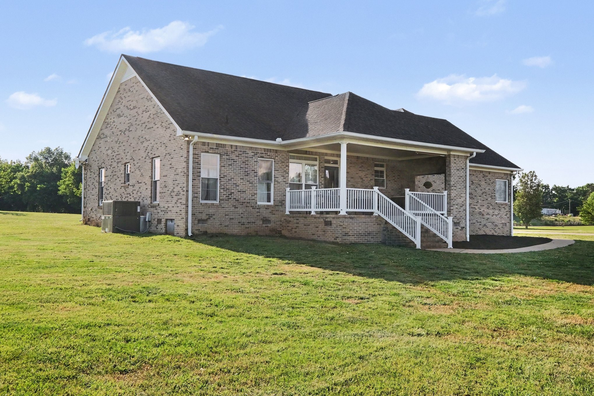 2829 Anes Station Road Lewisburg, TN 37091 - Photo 35 of 43 a view of a house with a yard