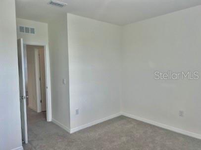 31284 Penny Surf Loop Wesley Chapel, FL 33545 - Photo 8 of 15 a view of an empty room
