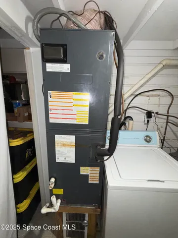 a utility room with a washer and dryer